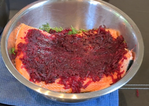 Grated beet over salmon