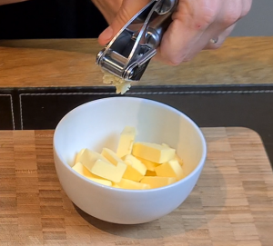 Melt butter with garlic