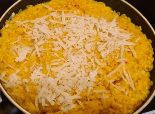 Add grated parmigiano reggiano