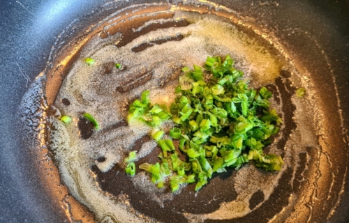 Stir fry onions in butter