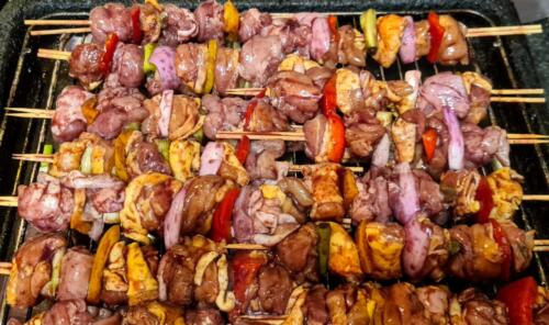 Put the skewers in the oven or grill